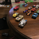 Three off-brand Micro Machines. I know the yellow & silver #1 came from a candy machine because I remember getting it in the mid 90s.